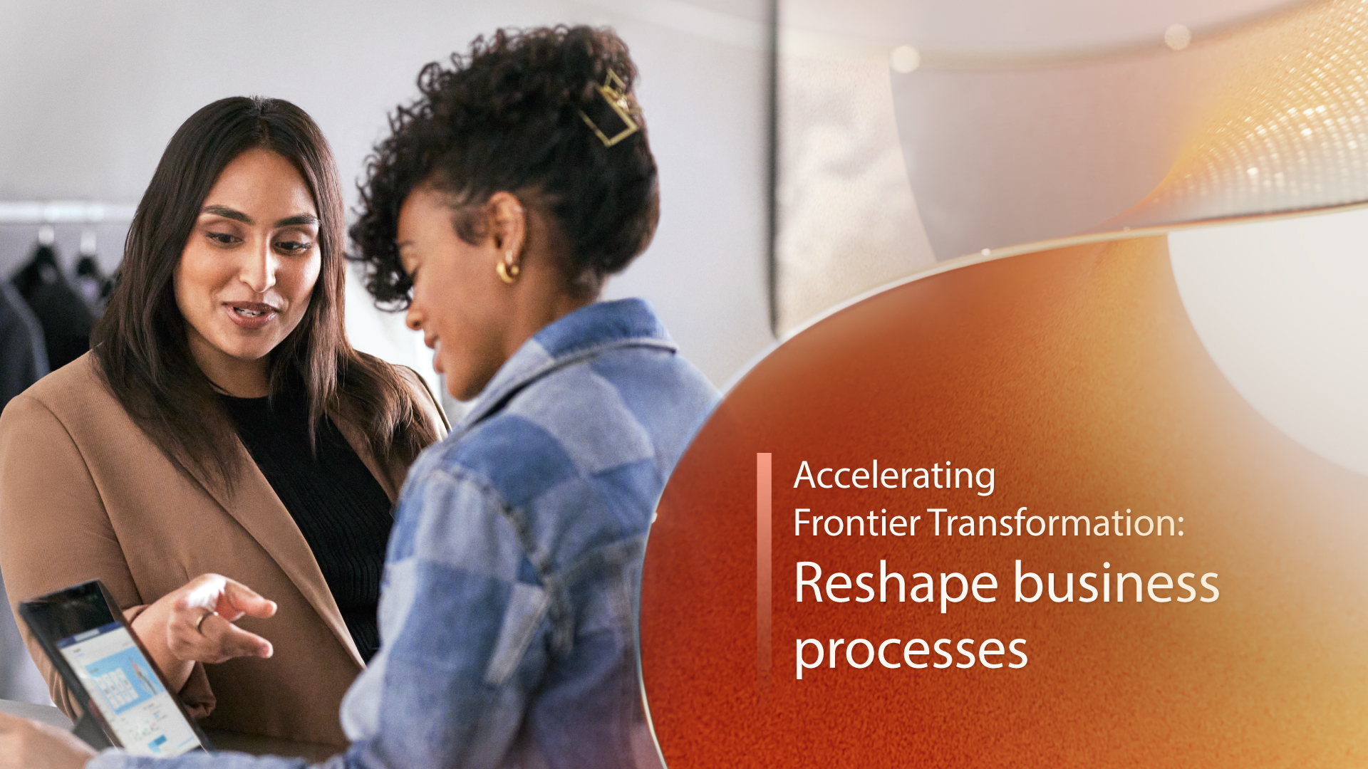 Two people reviewing information on a laptop beside the text “Accelerating Frontier Transformation: Reshape business processes.”